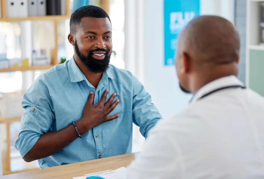 alcohol-withdrawal-timeline man speaking with a medical professional about alcohol withdrawal